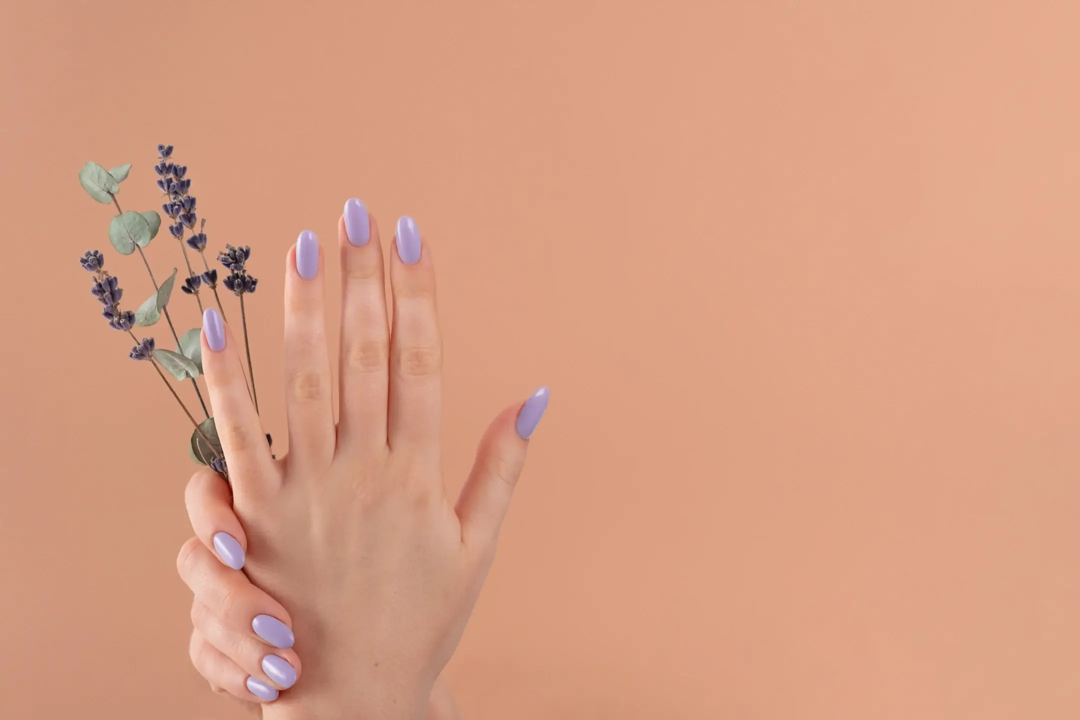 Elegant hand with lavender manicure and flowers 2026 03 27 01 56 26 utc